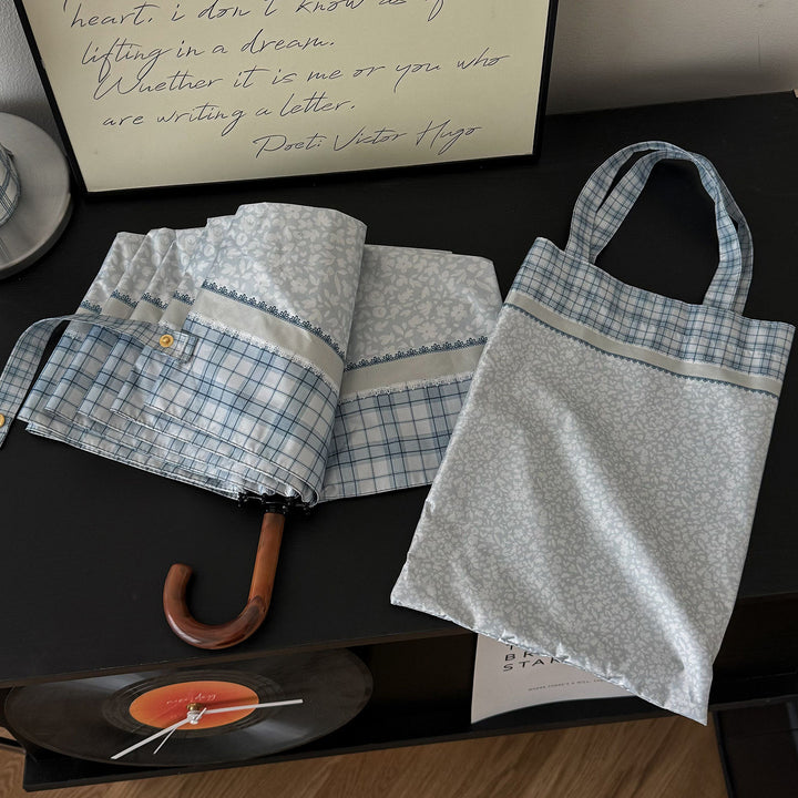 Women's tote bag with integrated folding umbrella Bowlift