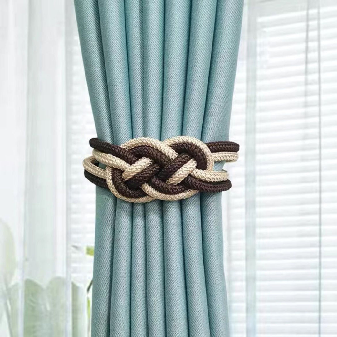 Decorative curtain tieback with braided design Bowlift