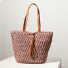 Handcrafted basket bag with fashionable tassel detail Bowlift