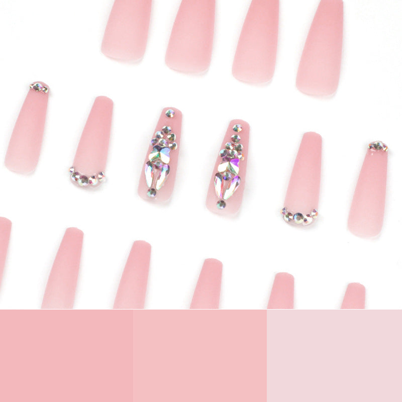 Artistic acrylic nails with glitter and rhinestone embellishments Bowlift