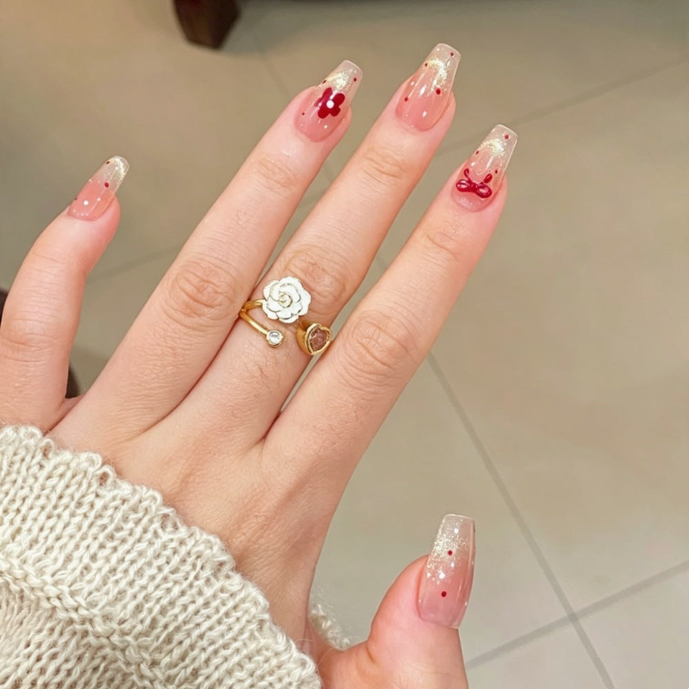 Artificial nails with sparkling accents and delicate patterns Bowlift