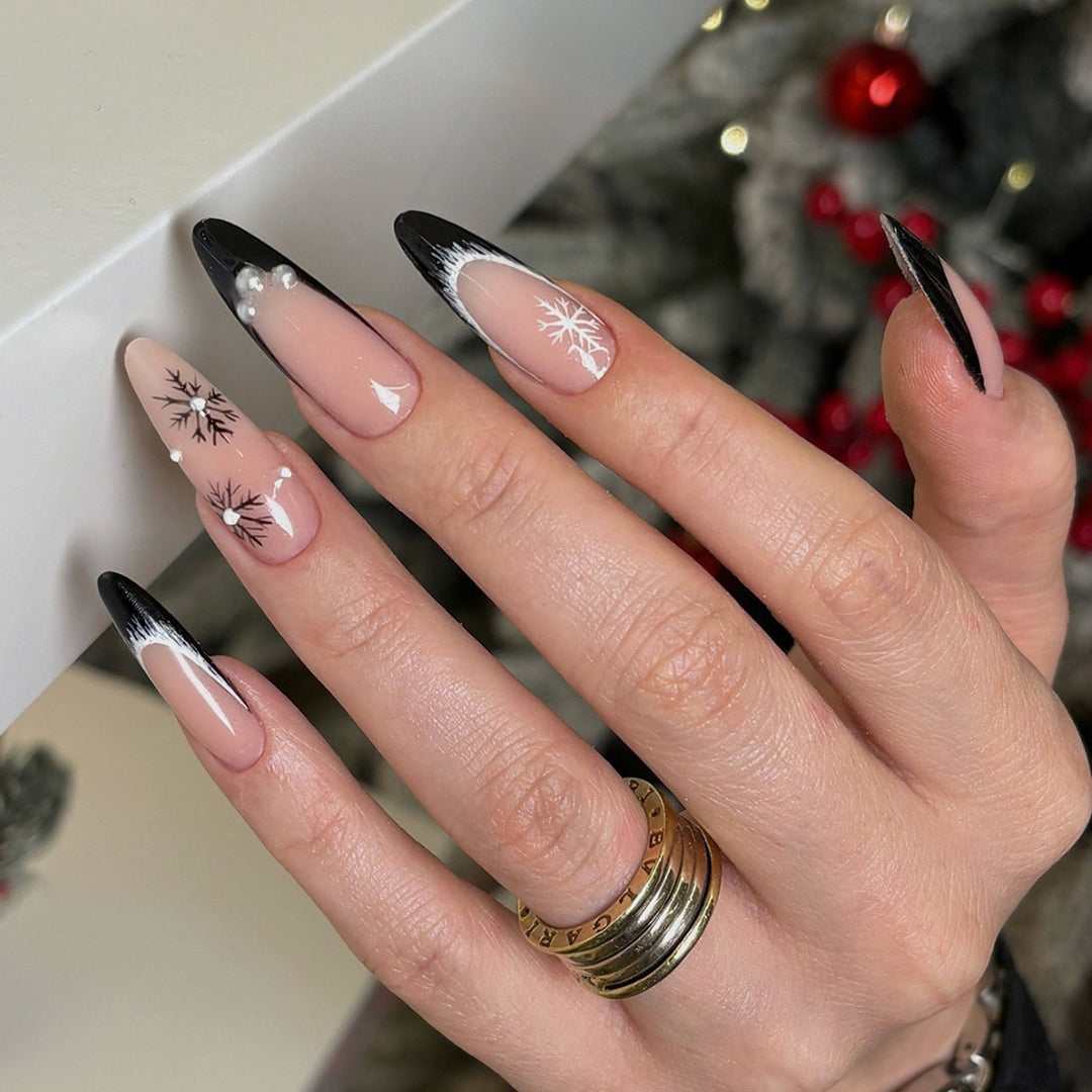 Artistic Stiletto Press-On Nail Set with Decorative Snowflake Designs Bowlift