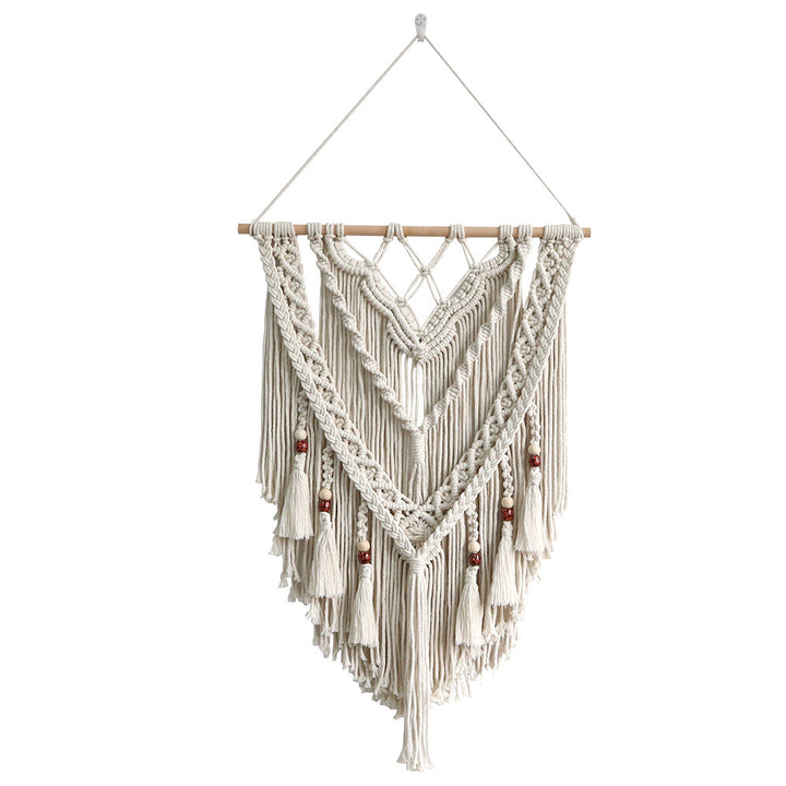 Hand-woven macrame wall hanging with decorative tassels