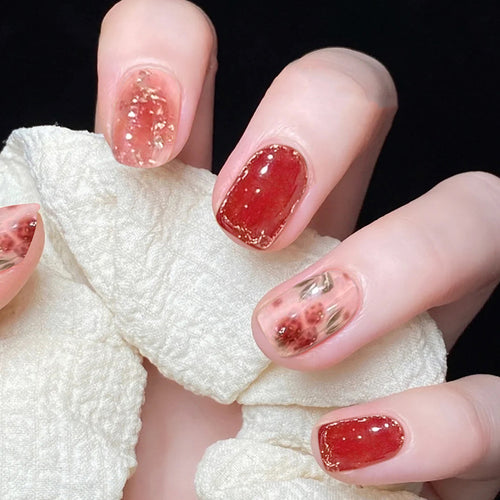 Artful nail art with sparkling elements and elegant accents Bowlift