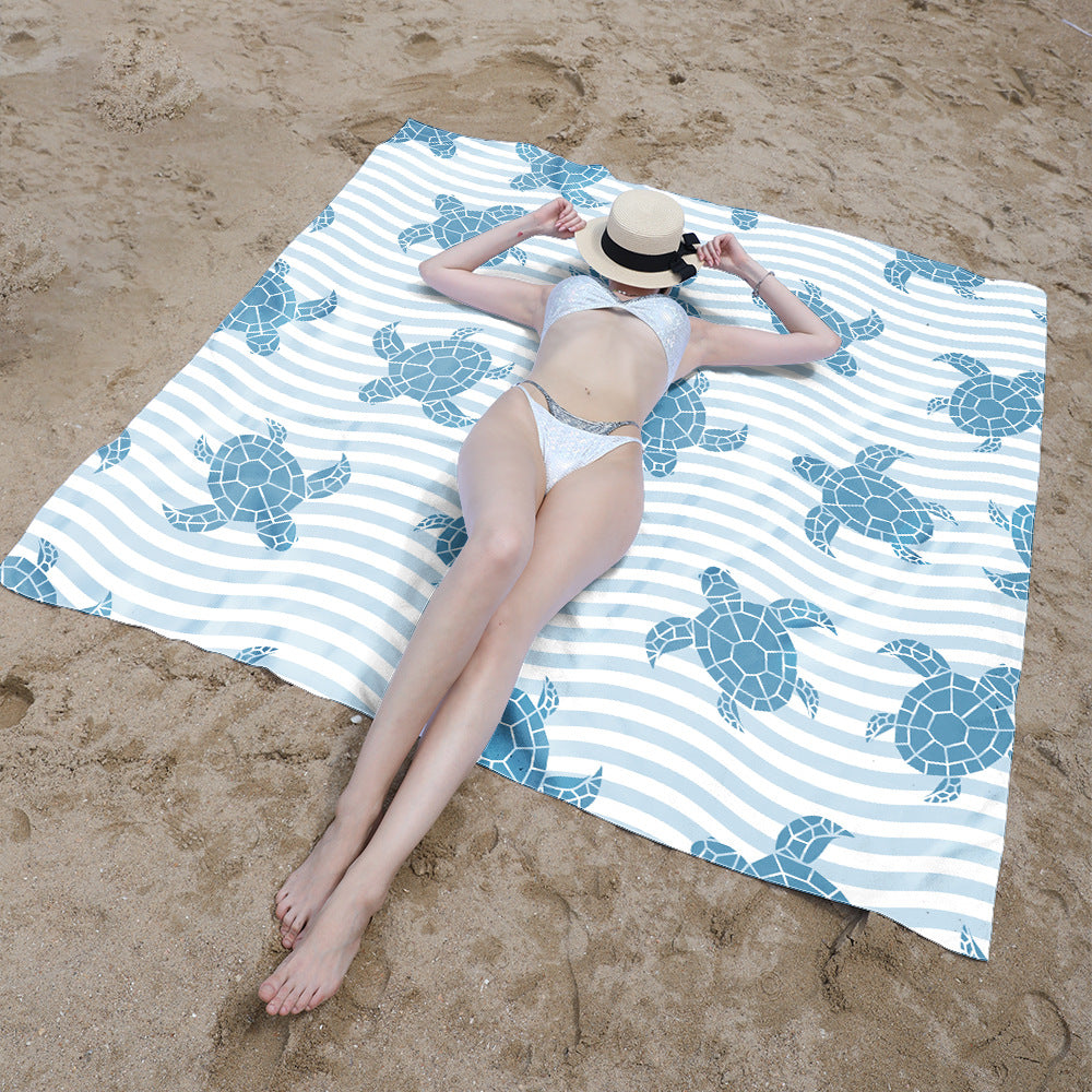 Beach blanket with colorful turtle pattern Bowlift
