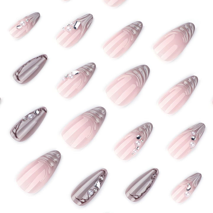Artful Nail Art with Pearl and Glitter Decorations Bowlift