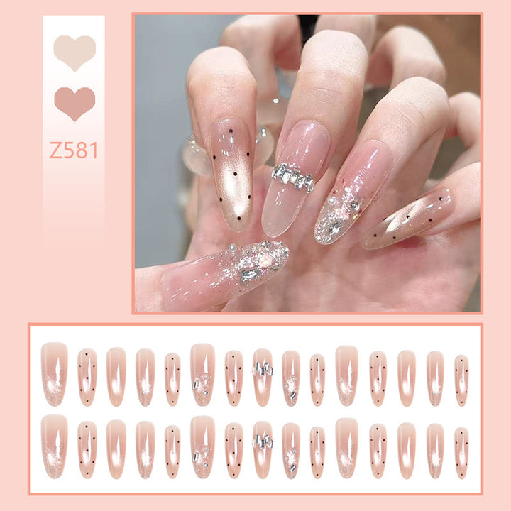 Artificial nail set with sparkling glitter and elegant jewelry details Bowlift