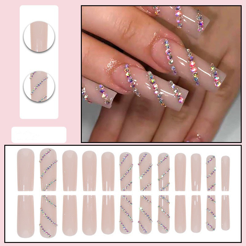 Acrylic nail set with sparkling rhinestone accents Bowlift