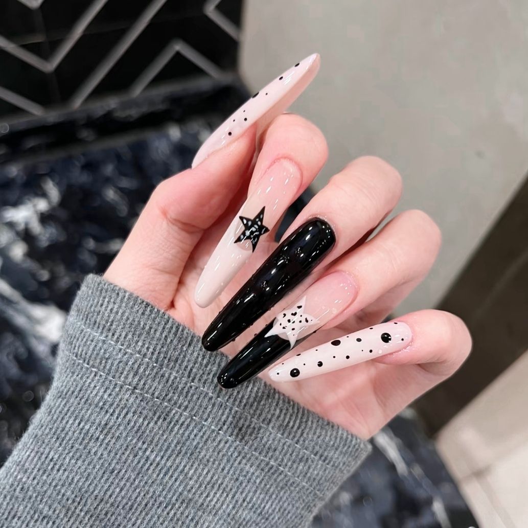 Artistic Long Stiletto Nail Enhancements Bowlift