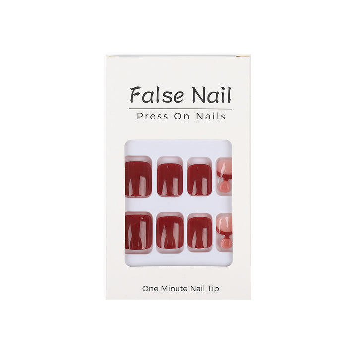 Acrylic nail set in elegant red and nude design Bowlift
