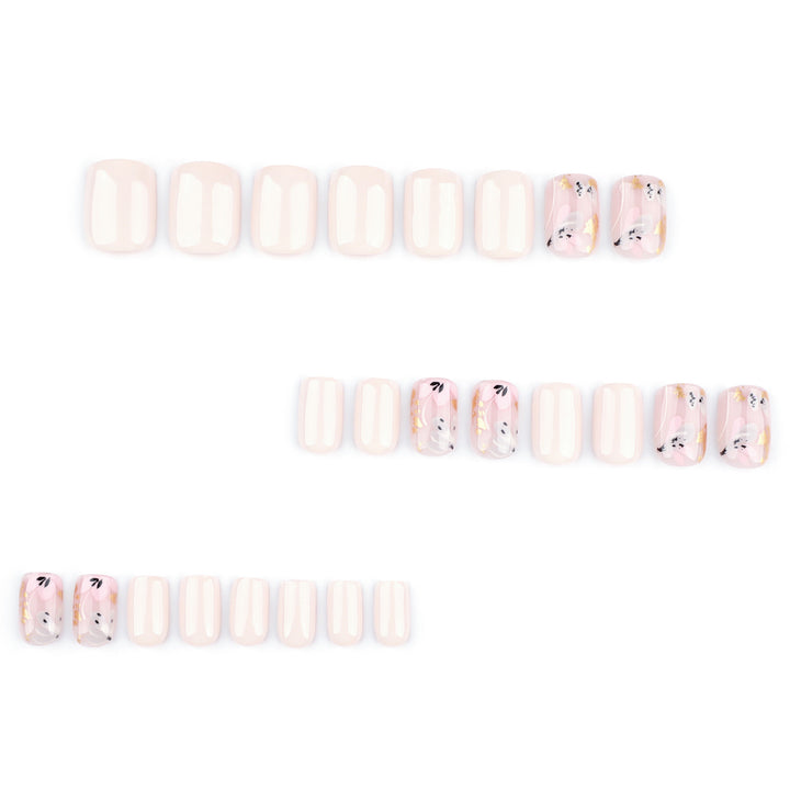 Elegant Artificial Nail Design with Floral Accents Bowlift