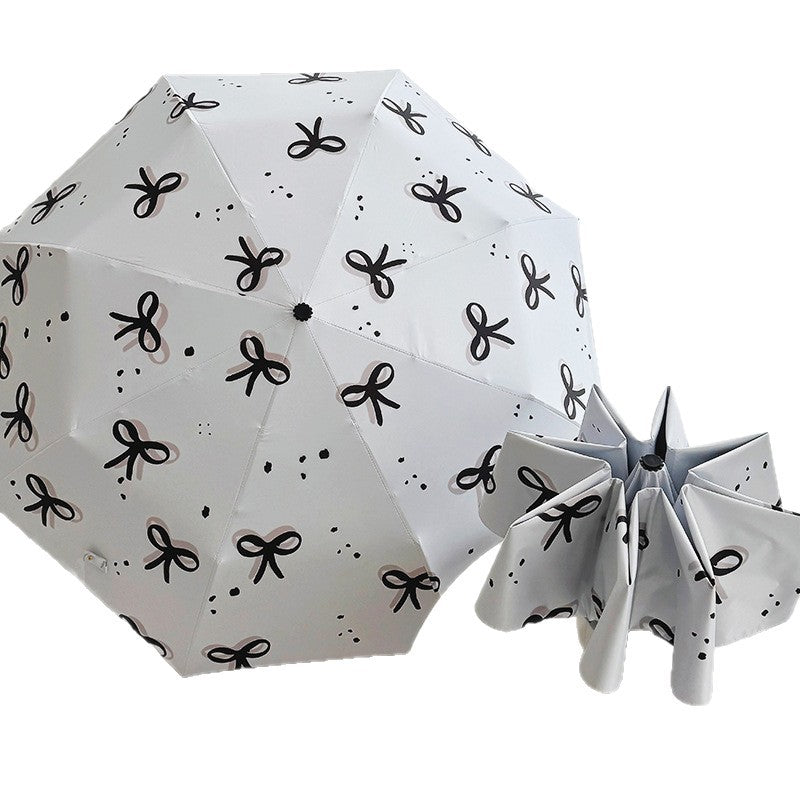 Women’s Folding Umbrella with Playful Bow Pattern Bowlift