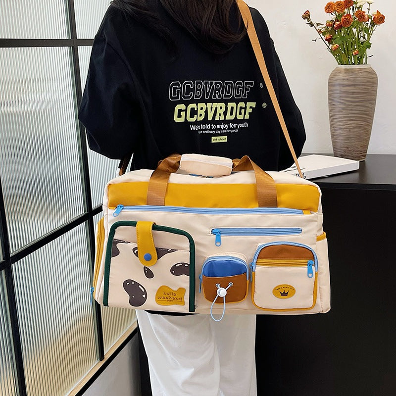 Playful Pet-Themed Travel Duffle Bag Bowlift