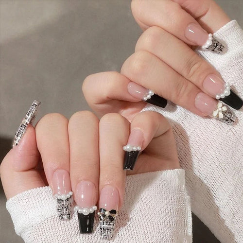 Glamorous artificial fingernails with glitter and moon designs Bowlift