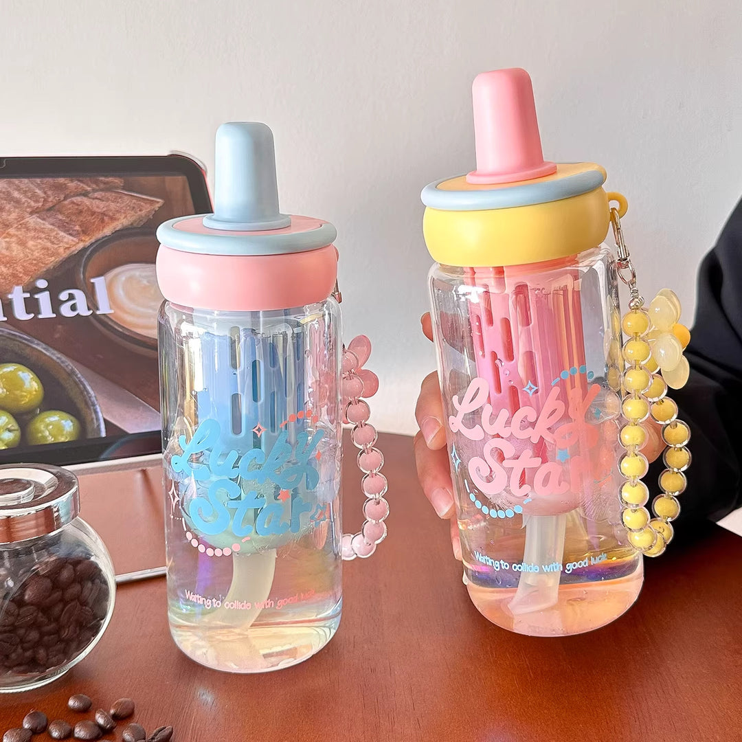 Women's creative drinking bottle with integrated straw and keychain Bowlift
