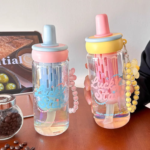 Women's creative drinking bottle with integrated straw and keychain Bowlift