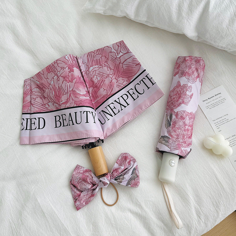 Women's compact umbrella with floral design Bowlift