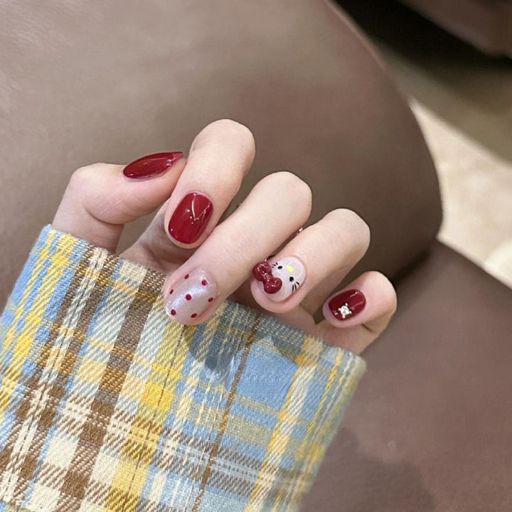 Artificial nail set with playful designs Bowlift