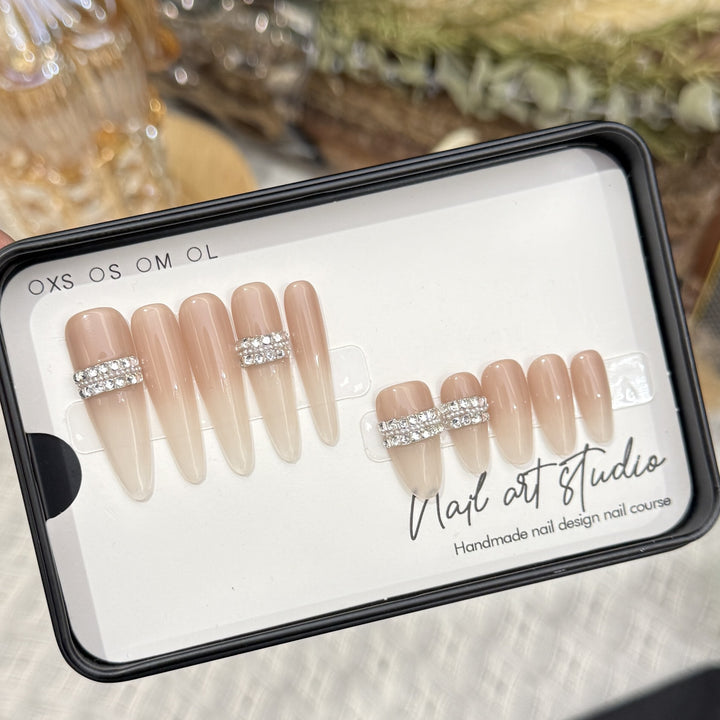 Stiletto Nail Art Tips with Rhinestone Accents Bowlift