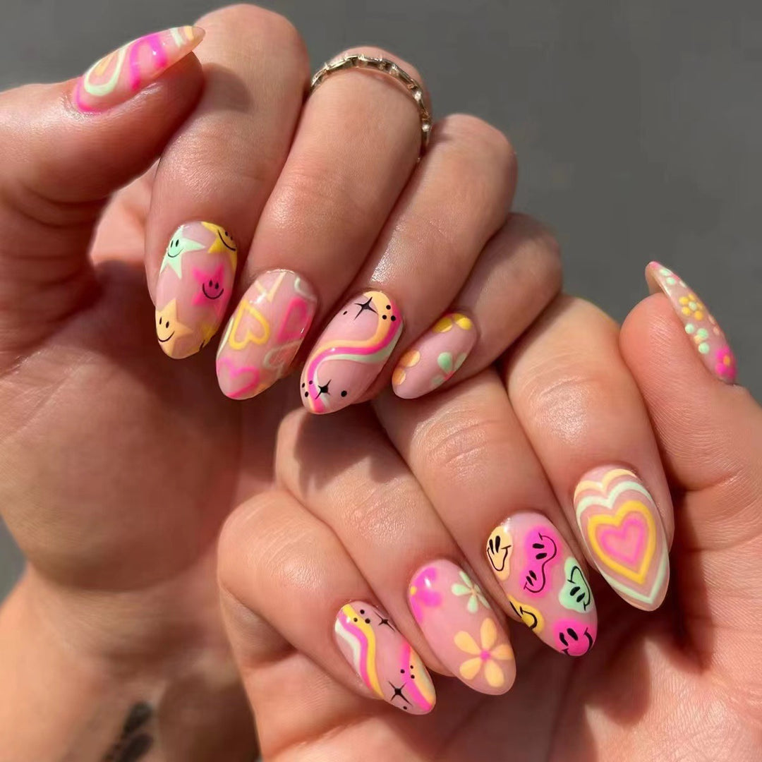 Nail set with playful 3D motifs and colorful designs Bowlift