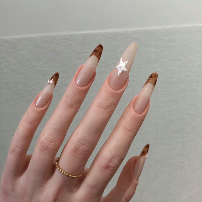 Elegant Long-Lasting Press-On Nails with Star Accents Bowlift
