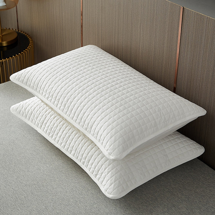 Quilted breathable zippered pillow protector with hypoallergenic padding Bowlift