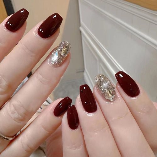 Artfully designed Gel nails with rhinestone decorations Bowlift