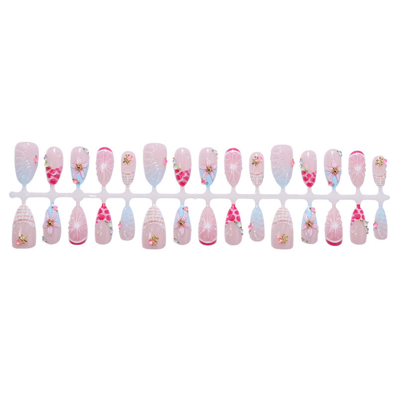 Creative nail art set with floral designs and decorative accents Bowlift