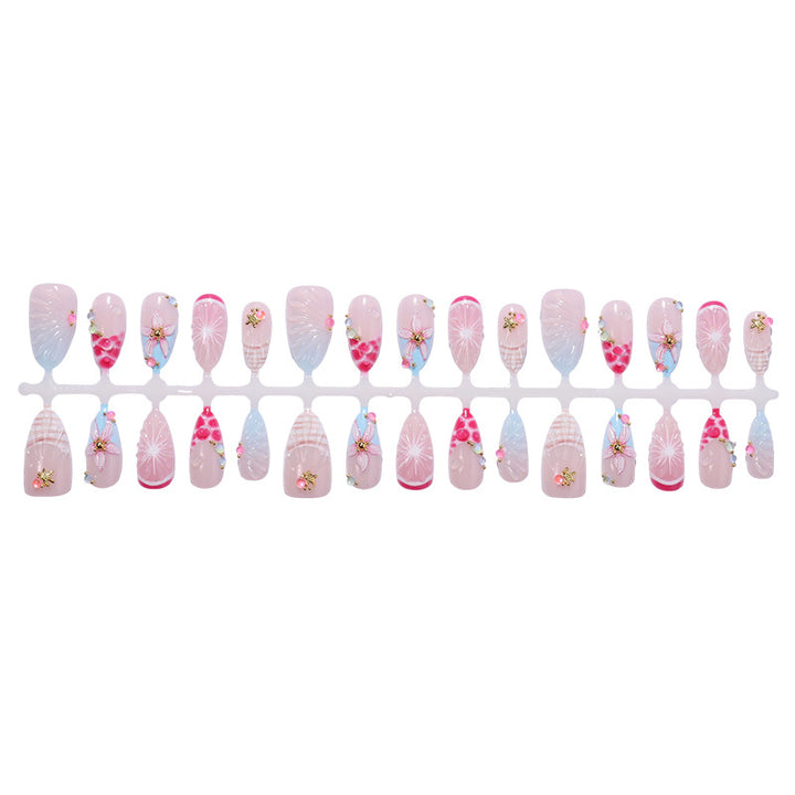 Creative nail art set with floral designs and decorative accents Bowlift