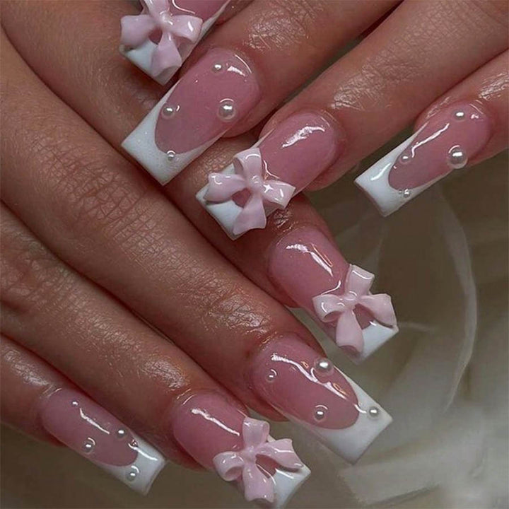 Artificial nail set with elegant bow and pearl decorations Bowlift