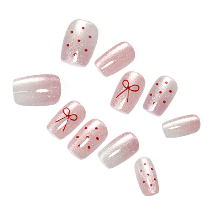Artificial nail art with cute bow design Bowlift