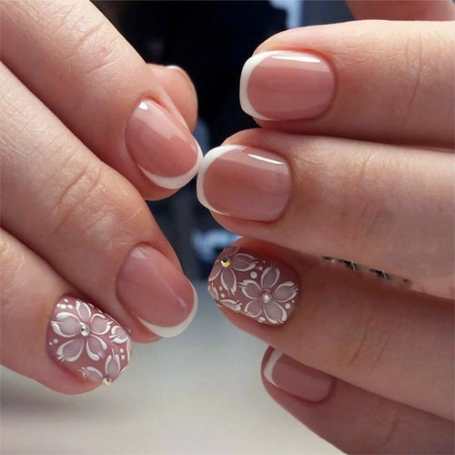 Artificial nail set with elegant French design and floral accents Bowlift