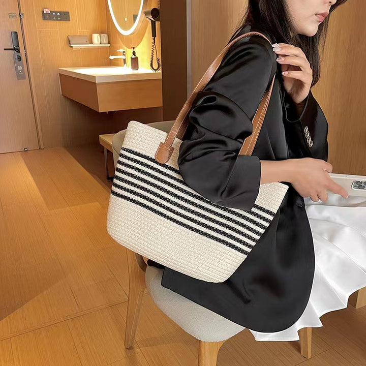 Elegant Tote Bag Made of Woven Bast Material with Robust Leather Accents Bowlift