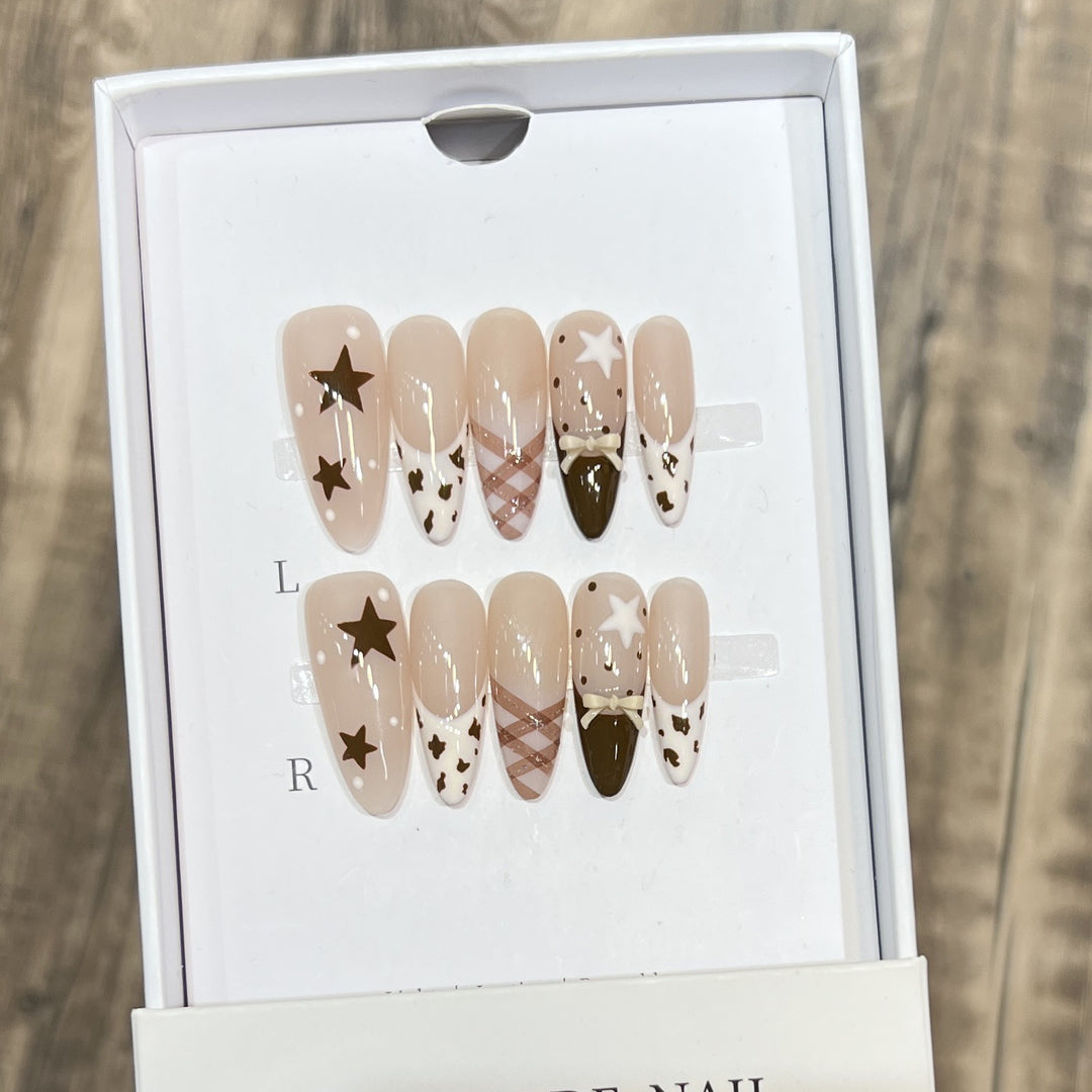 Elegant Stiletto Press-On Nail Set with Decorative Accents Bowlift