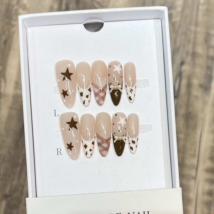 Elegant Stiletto Press-On Nail Set with Decorative Accents Bowlift