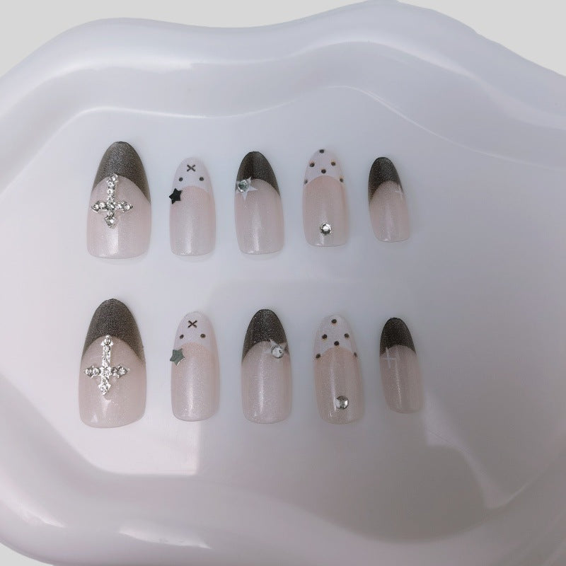 Glittering artificial nail design with elegant accents Bowlift