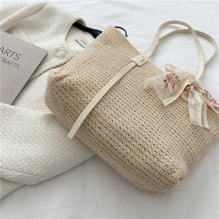 Elegant Woven Straw Tote Bag with Decorative Bow