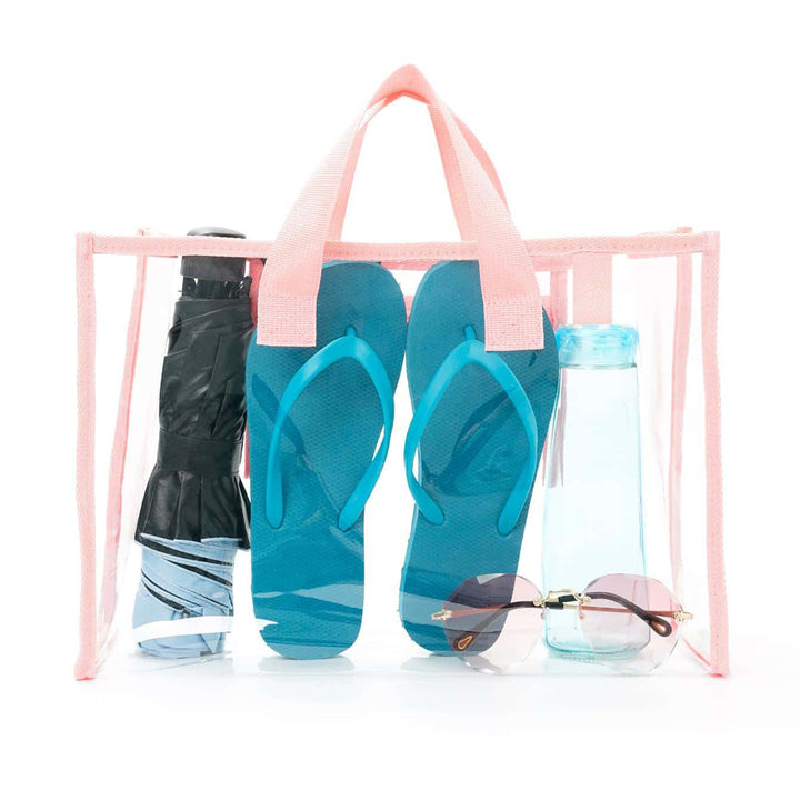 Transparent beach bag with sturdy carrying handles and various compartments Bowlift