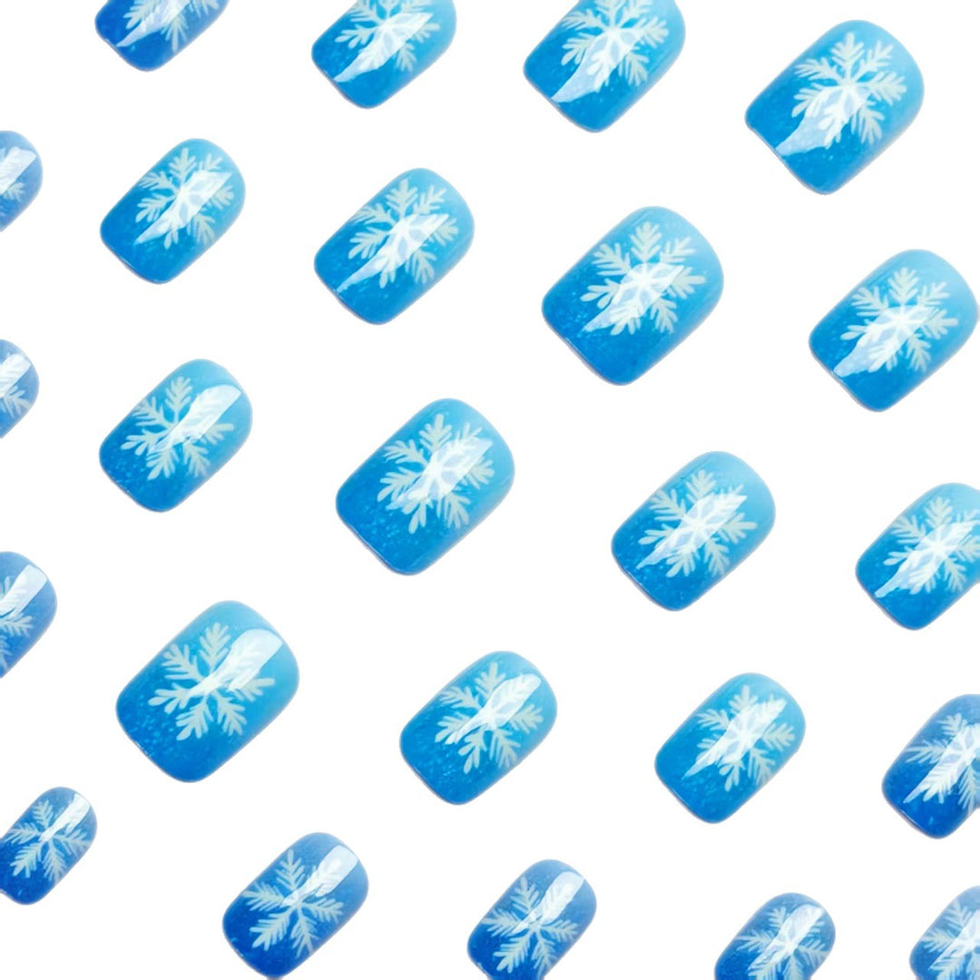 Artificial nails with sparkling winter flake design Bowlift