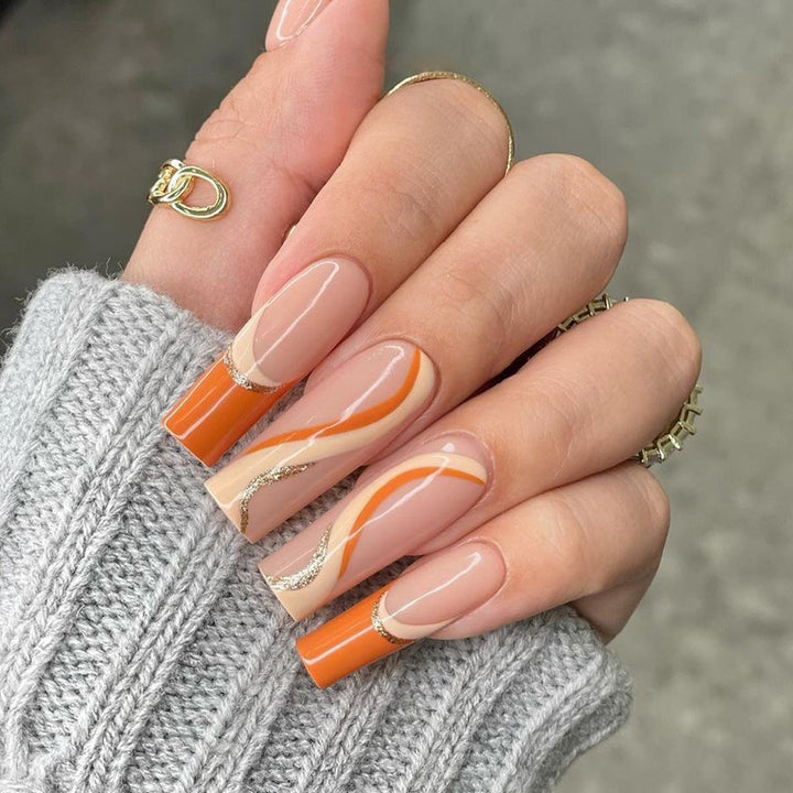 Artistic acrylic nails with elegant accents Bowlift