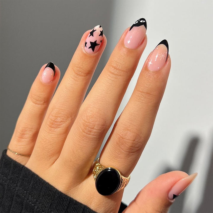 Artful Nail Art with Star and Black Tip Design Bowlift