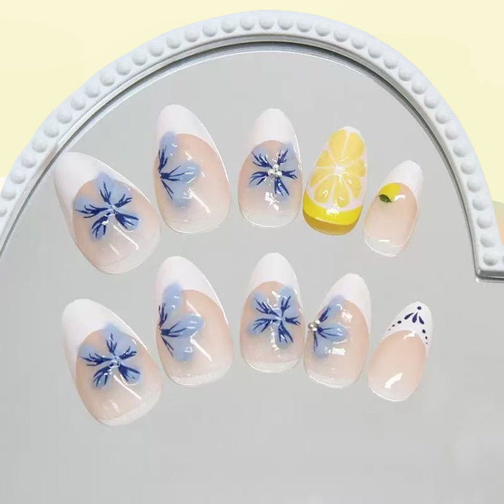 Artistic artificial nails with floral and fruity accents Bowlift