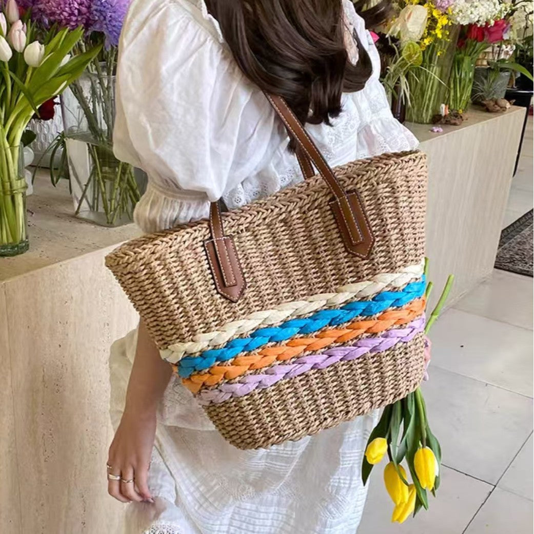 Shoulder bag made of braided material with colorful detail Bowlift