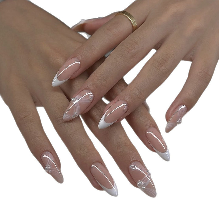 Creative acrylic nail set with elegant tips and glitter decorations Bowlift