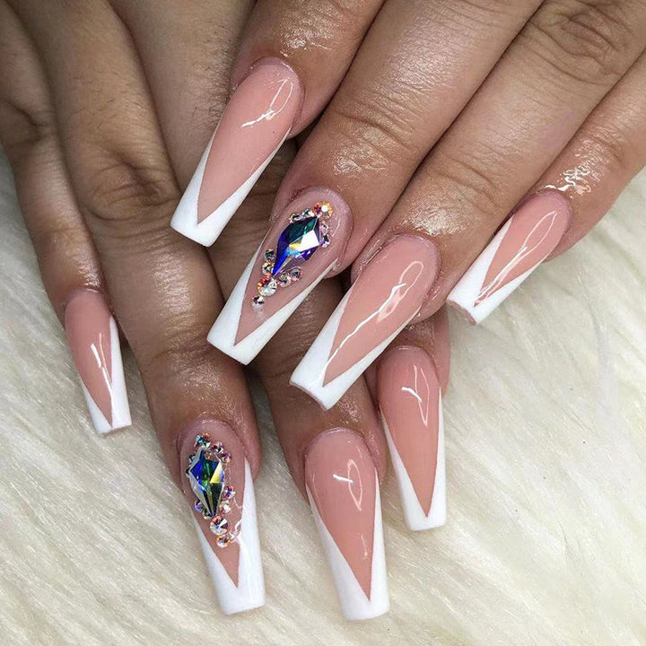 Artificial nails with elegant tips and rhinestone detail Bowlift