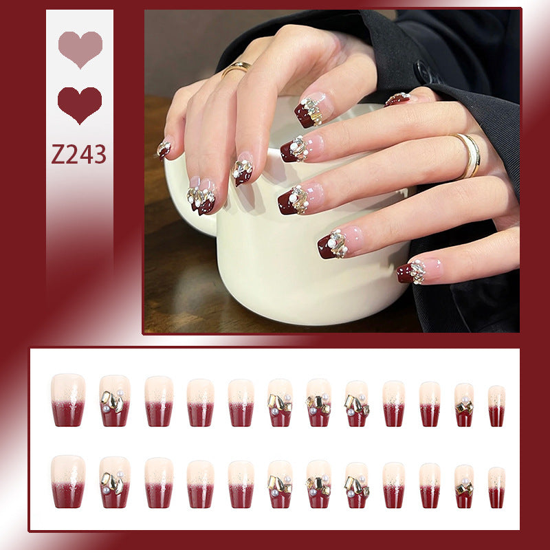 Acrylic nail set with elegant glitter and flower accents Bowlift