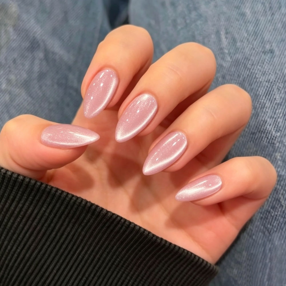 Glamorous artificial nails with shimmering effect and elegant shape Bowlift