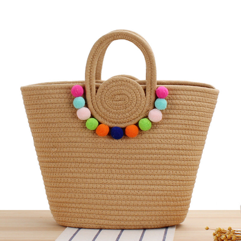 Fashionable handbag with playful pompom decoration Bowlift