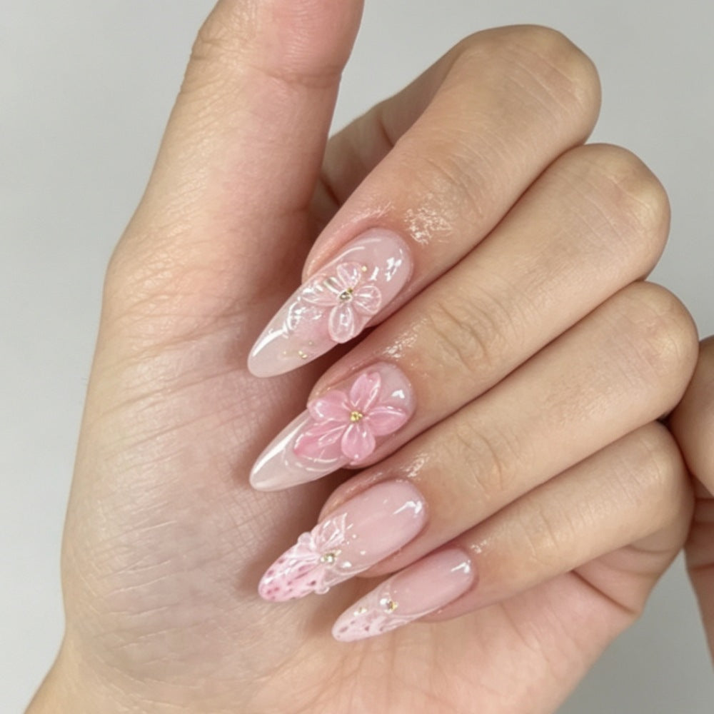 Artificial nails with romantic flower and butterfly accents Bowlift