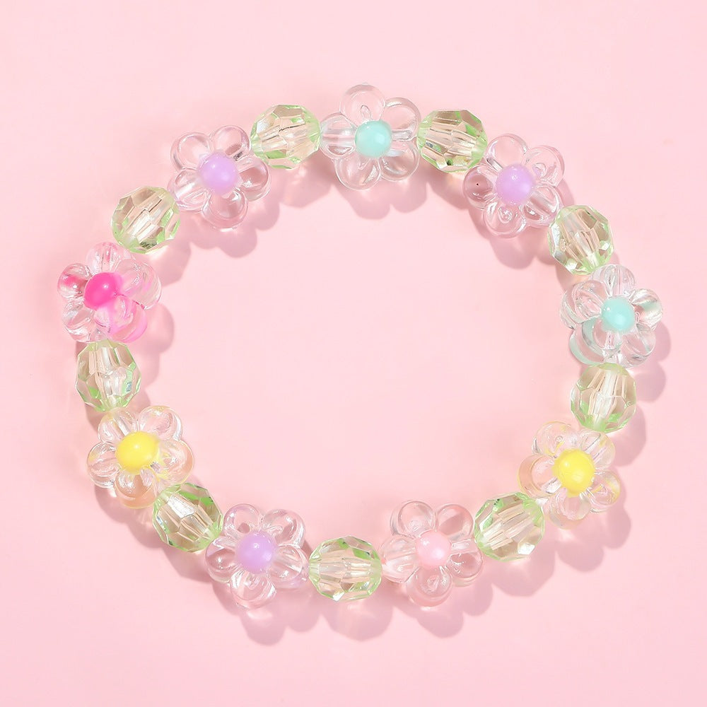 Friendship bracelet with colorful flower motifs Bowlift